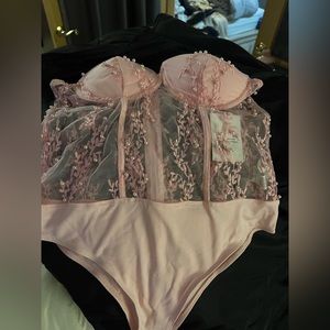 Pink bodysuit